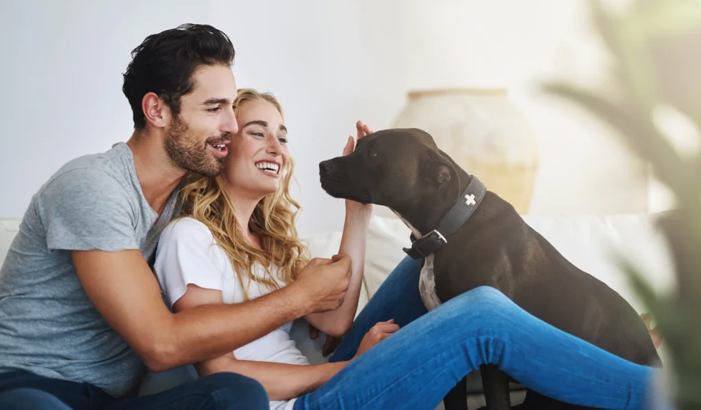 couple with a dog at pet-friendly Wild Air Landing apartments in zionsville